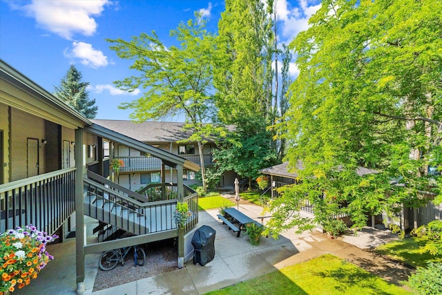 180 Vista Ln Unit 238, Bigfork, MT 59911 - view of property's community featuring a patio and stairway