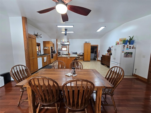 611 S Canyon Dr, Seeley Lake, MT 59868 - dining space featuring lofted ceiling, light wood-style flooring, and a ceiling fan
