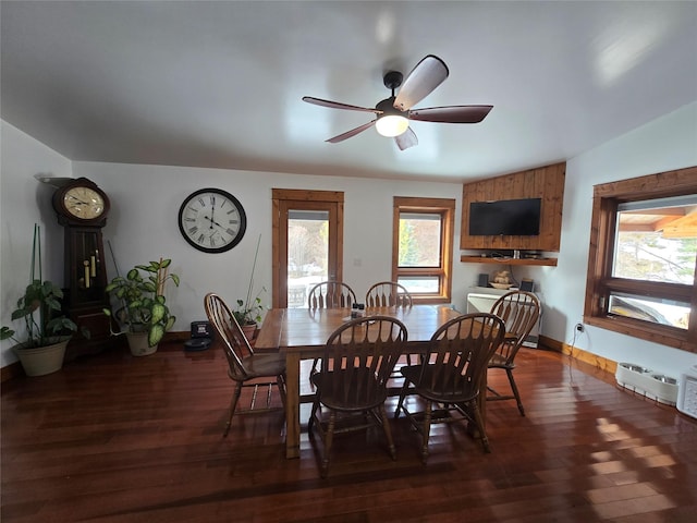 611 S Canyon Dr, Seeley Lake, MT 59868 - dining area featuring plenty of natural light, dark wood-style flooring, and a ceiling fan