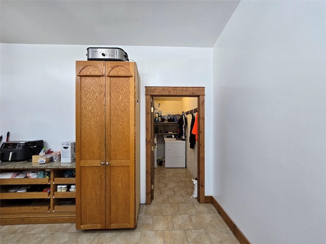 611 S Canyon Dr, Seeley Lake, MT 59868 - corridor with washer / clothes dryer and baseboards