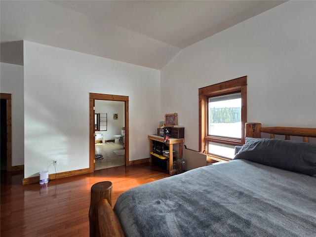 611 S Canyon Dr, Seeley Lake, MT 59868 - bedroom featuring wood finished floors and lofted ceiling