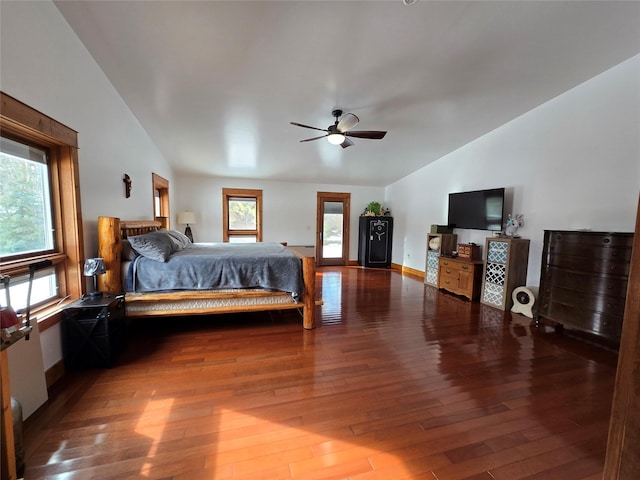 611 S Canyon Dr, Seeley Lake, MT 59868 - bedroom with vaulted ceiling and wood finished floors