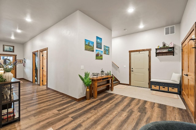 378 Skookum Rd, Lakeside, MT 59922 - foyer featuring wood finished floors, stairway, baseboards, and recessed lighting