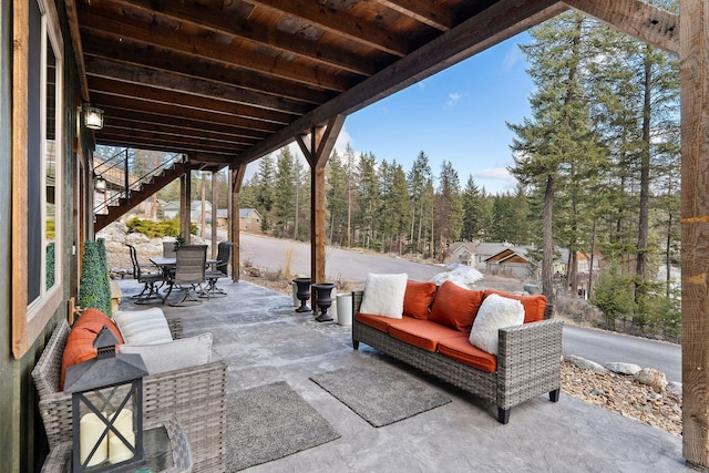 378 Skookum Rd, Lakeside, MT 59922 - view of patio / terrace featuring stairway and outdoor dining area