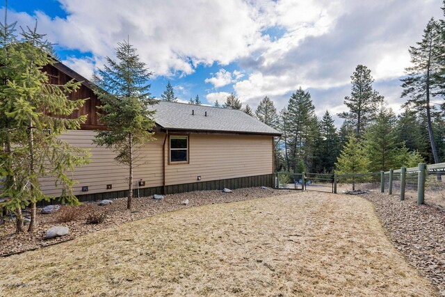378 Skookum Rd, Lakeside, MT 59922 - view of property exterior featuring fence and a gate
