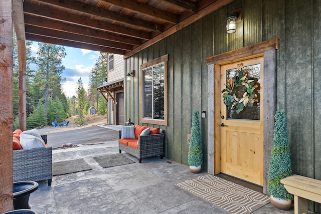 378 Skookum Rd, Lakeside, MT 59922 - view of patio with a garage