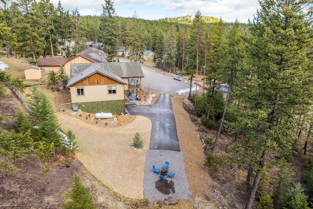 378 Skookum Rd, Lakeside, MT 59922 - view from above of property with a heavily wooded area