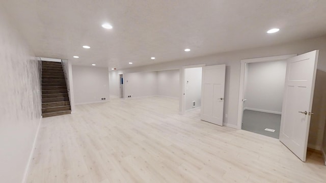 3805 US Highway 93 N, Eureka, MT 59917 - finished below grade area featuring recessed lighting, stairs, and light wood-style floors