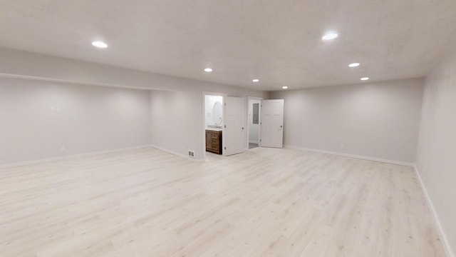 3805 US Highway 93 N, Eureka, MT 59917 - finished basement with recessed lighting, light wood-type flooring, and electric panel