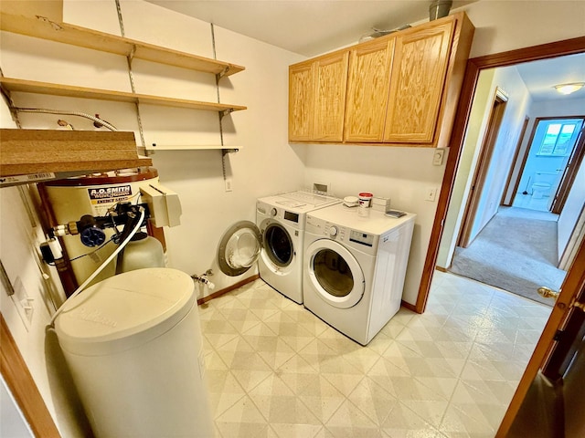 54650 Herak Rd, Charlo, MT 59824 - laundry area with baseboards, light floors, and separate washer and dryer