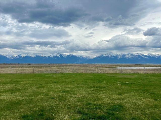54650 Herak Rd, Charlo, MT 59824 - view of yard featuring a mountain view, a rural view, and fence
