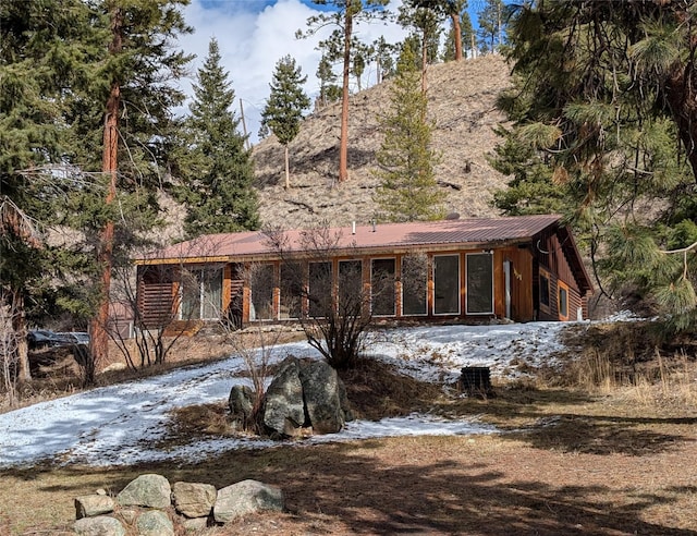 view of front of property with metal roof