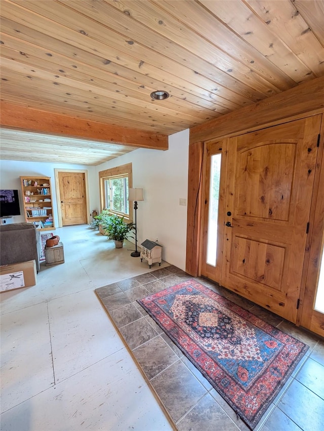 foyer entrance with wood ceiling