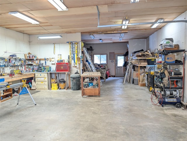 garage with a workshop area