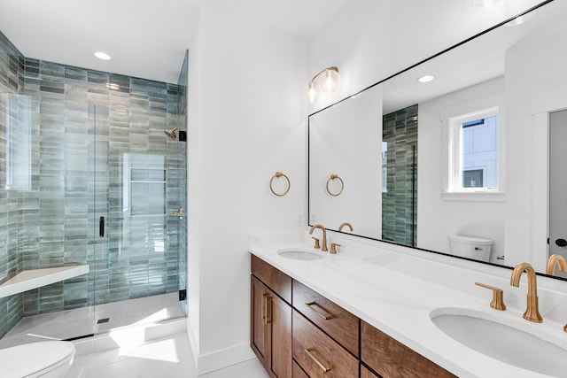 5665 Cattle Dr, Missoula, MT 59808 - bathroom featuring toilet, a stall shower, recessed lighting, double vanity, and tile patterned flooring