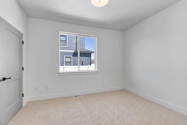 5665 Cattle Dr, Missoula, MT 59808 - carpeted empty room with baseboards