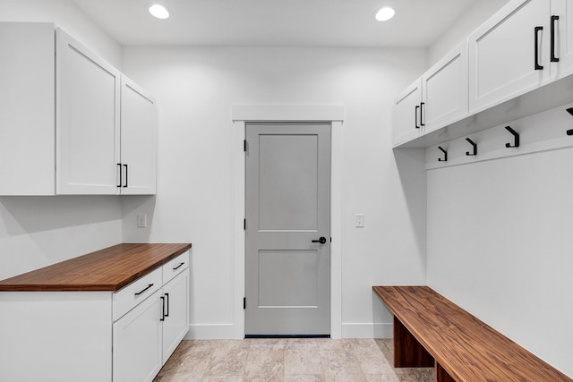 5665 Cattle Dr, Missoula, MT 59808 - mudroom with baseboards and recessed lighting
