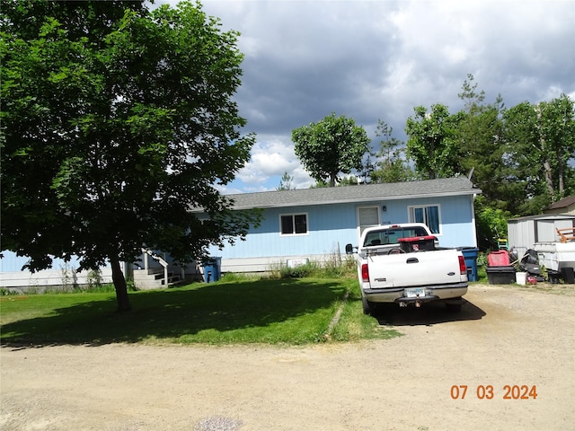 6445 Mullan Rd, Missoula, MT 59808 - view of front of house with a front lawn