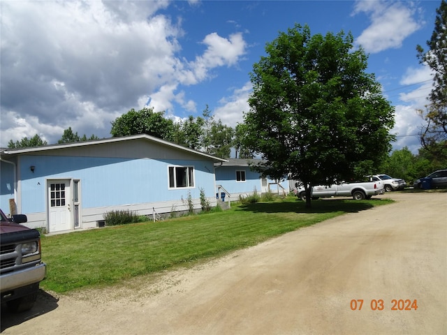 6445 Mullan Rd, Missoula, MT 59808 - view of front of house with a front yard