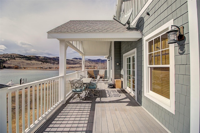 23877 3rd St, Dayton, MT 59914 - deck featuring a water view and outdoor dining space