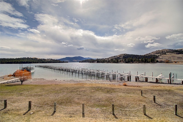 23877 3rd St, Dayton, MT 59914 - water view featuring mountains and a dock