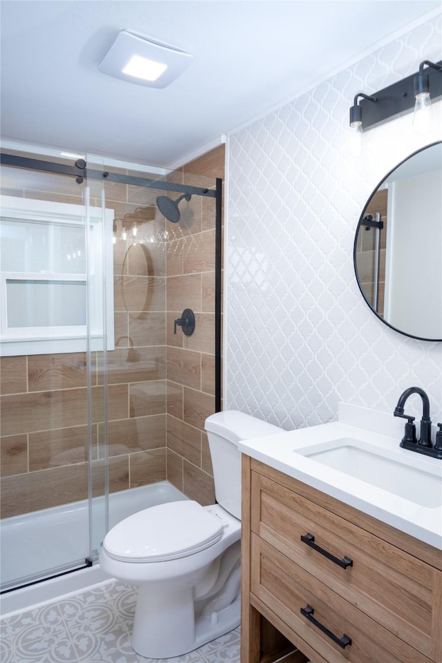 1613 Main Ave, Libby, MT 59923 - bathroom with vanity, a stall shower, toilet, and tile patterned flooring