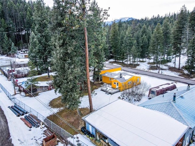 1613 Main Ave, Libby, MT 59923 - snowy aerial view with a forest view and a mountain view