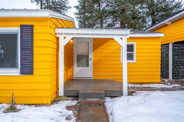 1613 Main Ave, Libby, MT 59923 - view of snow covered property entrance