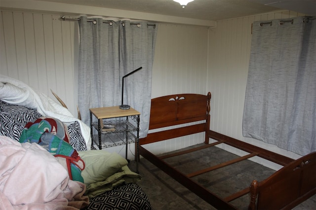 1626 W Central Ave, Missoula, MT 59801 - carpeted bedroom featuring wood walls