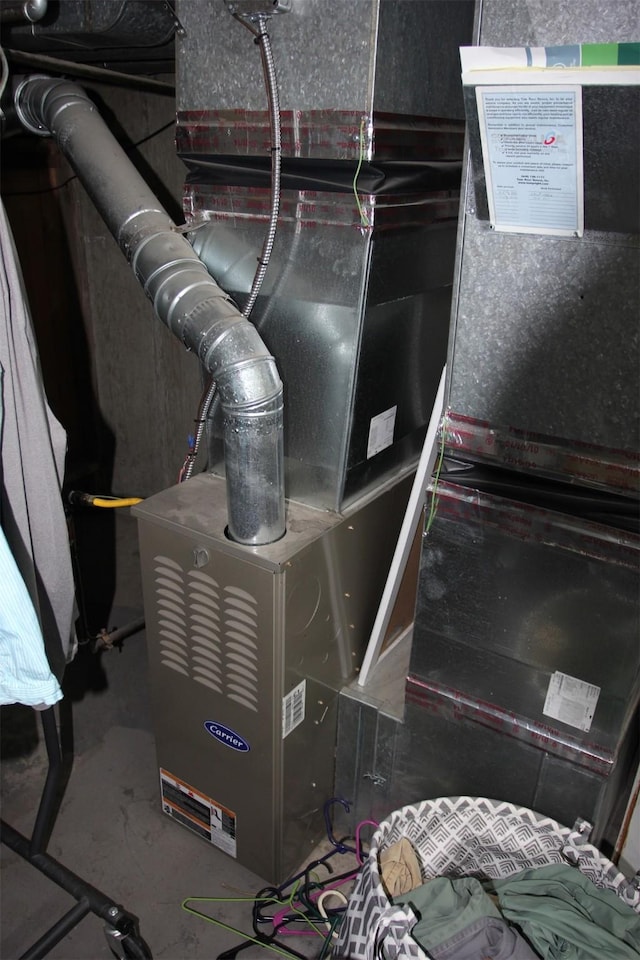 1626 W Central Ave, Missoula, MT 59801 - utility room featuring heating unit