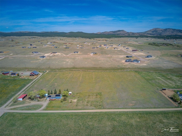 overview of rural landscape featuring a mountain backdrop