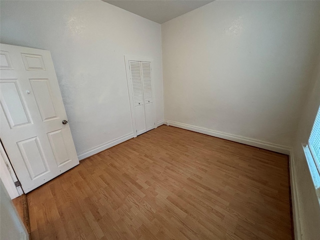 1022 Lewisohn St, Butte, MT 59701 - unfurnished bedroom featuring light wood-style flooring and baseboards