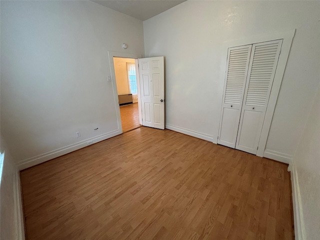1022 Lewisohn St, Butte, MT 59701 - unfurnished bedroom featuring light wood-style floors and a closet