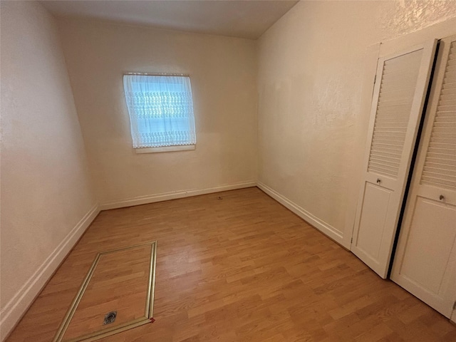 1022 Lewisohn St, Butte, MT 59701 - unfurnished bedroom featuring light wood-style floors and baseboards