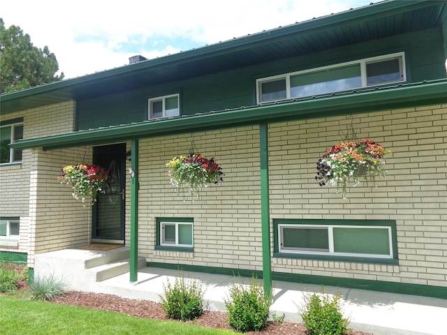 117 Rocky Mountain Ln, Butte, MT 59701 - view of side of property with brick siding