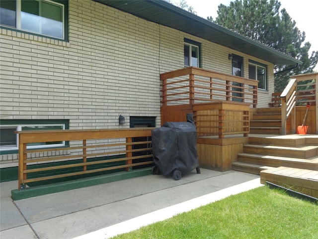 117 Rocky Mountain Ln, Butte, MT 59701 - back of house featuring stairway and brick siding