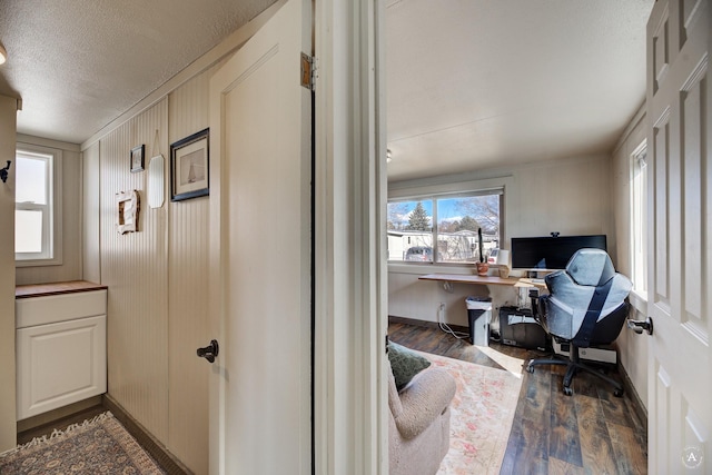 2931 Melrose Rd, Helena, MT 59602 - office area featuring wood finished floors, a textured ceiling, and baseboards