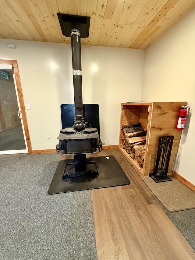 421 Cherry Creek Rd, Thompson Falls, MT 59873 - misc room featuring baseboards, a wood stove, and wood ceiling