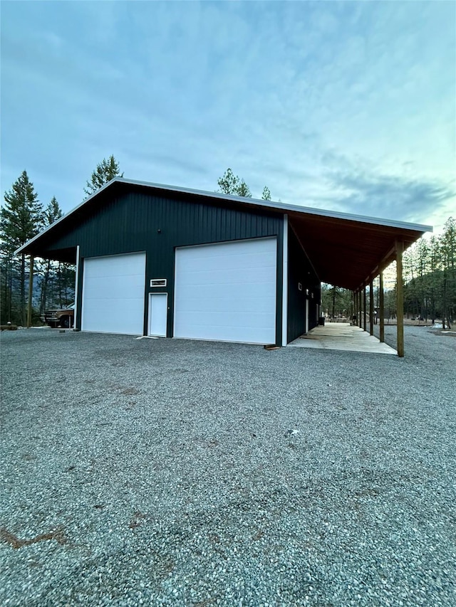 421 Cherry Creek Rd, Thompson Falls, MT 59873 - garage with gravel driveway and a garage