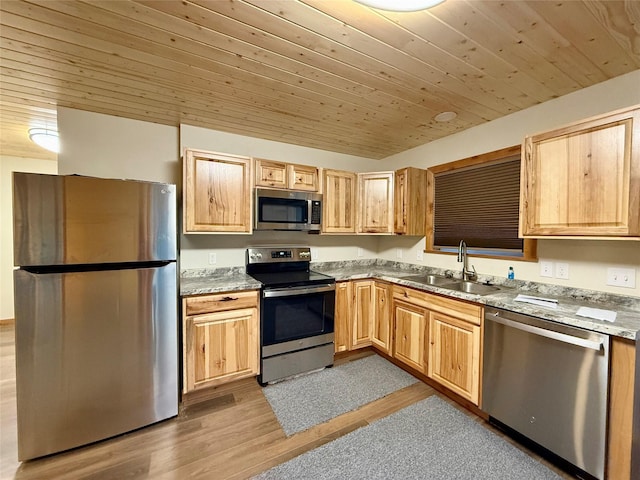 421 Cherry Creek Rd, Thompson Falls, MT 59873 - kitchen featuring stainless steel appliances, a sink, light brown cabinets, wooden ceiling, and light wood-style flooring