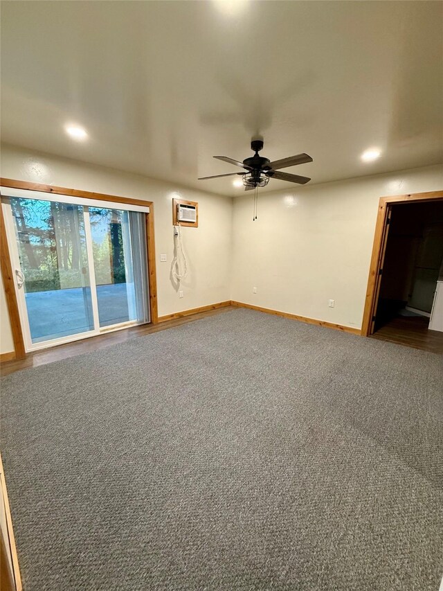 421 Cherry Creek Rd, Thompson Falls, MT 59873 - spare room featuring ceiling fan, recessed lighting, a wall unit AC, and baseboards