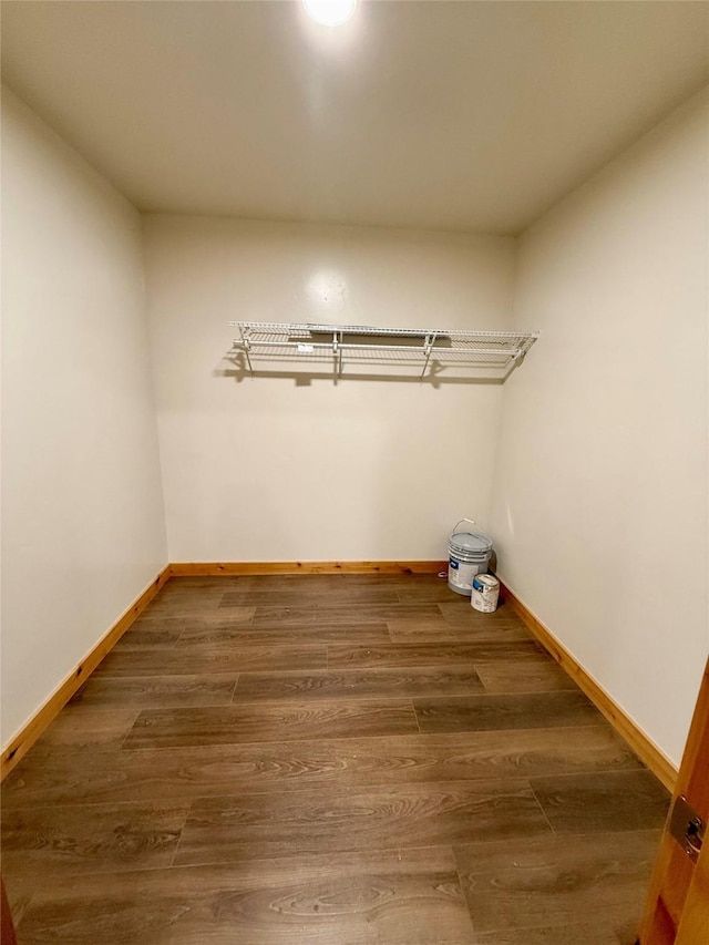 421 Cherry Creek Rd, Thompson Falls, MT 59873 - laundry area with wood finished floors and baseboards