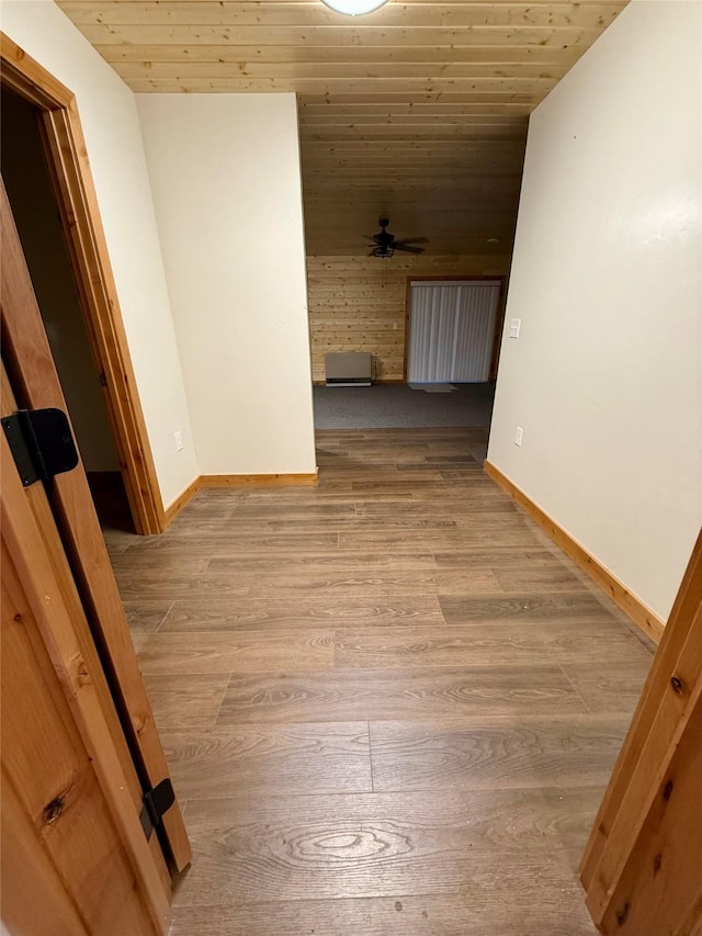 421 Cherry Creek Rd, Thompson Falls, MT 59873 - spare room with wood finished floors, baseboards, wood ceiling, ceiling fan, and lofted ceiling
