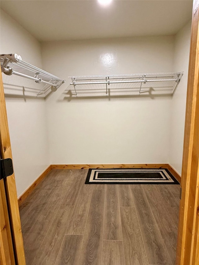 421 Cherry Creek Rd, Thompson Falls, MT 59873 - walk in closet featuring wood finished floors