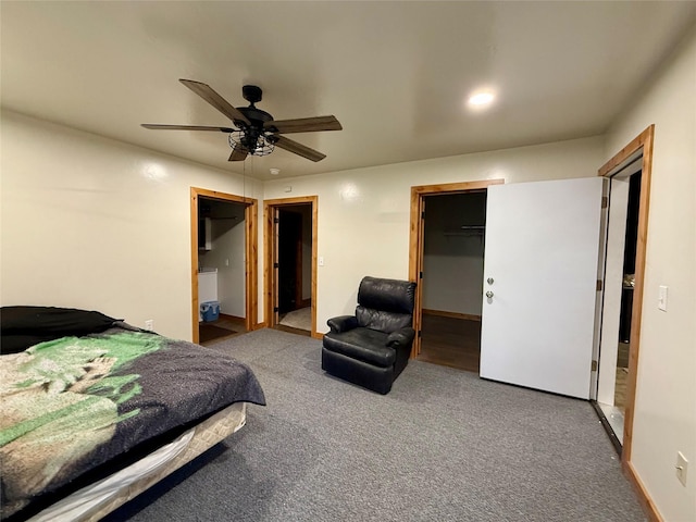 421 Cherry Creek Rd, Thompson Falls, MT 59873 - carpeted bedroom featuring a ceiling fan, a closet, and a walk in closet