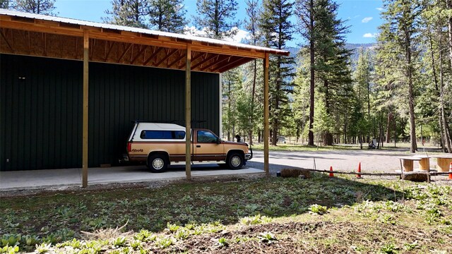 421 Cherry Creek Rd, Thompson Falls, MT 59873 - view of car parking with a carport