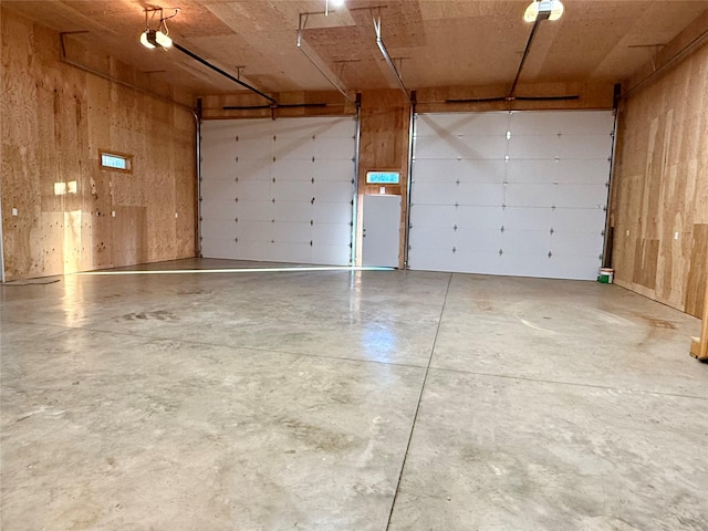 421 Cherry Creek Rd, Thompson Falls, MT 59873 - garage featuring a garage door opener