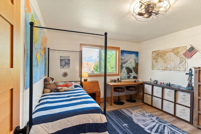 140 Swan River Rd, Bigfork, MT 59911 - bedroom featuring wood finished floors