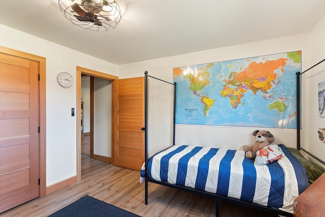 140 Swan River Rd, Bigfork, MT 59911 - bedroom with light wood finished floors and baseboards