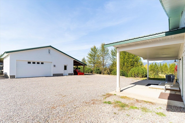 140 Swan River Rd, Bigfork, MT 59911 - view of yard featuring a garage and an outdoor structure